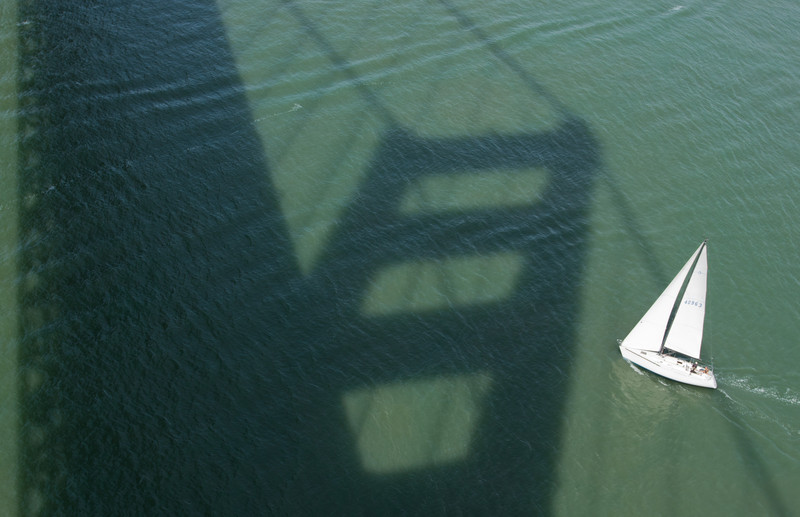 Sailboat under the bridge |  
